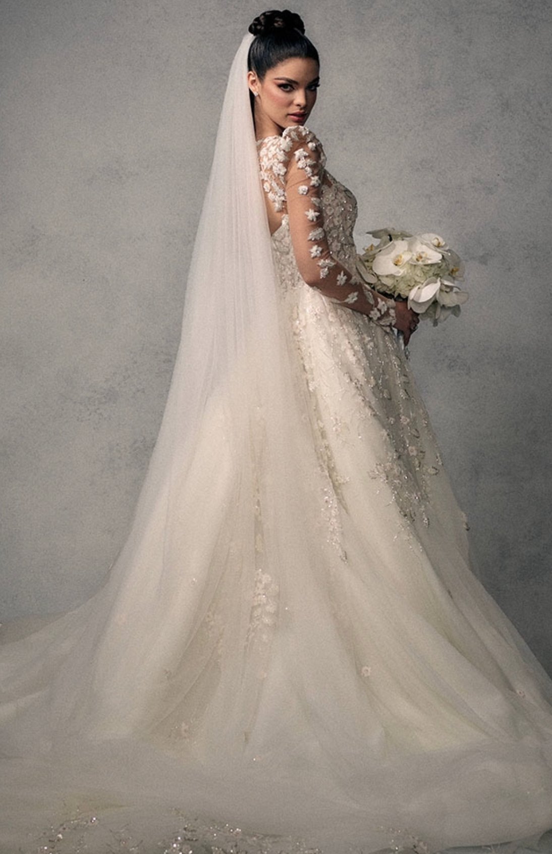 All the Details on the Showstopping Wedding Dresses Nadia Ferreira Wore to Marry Marc Anthony
