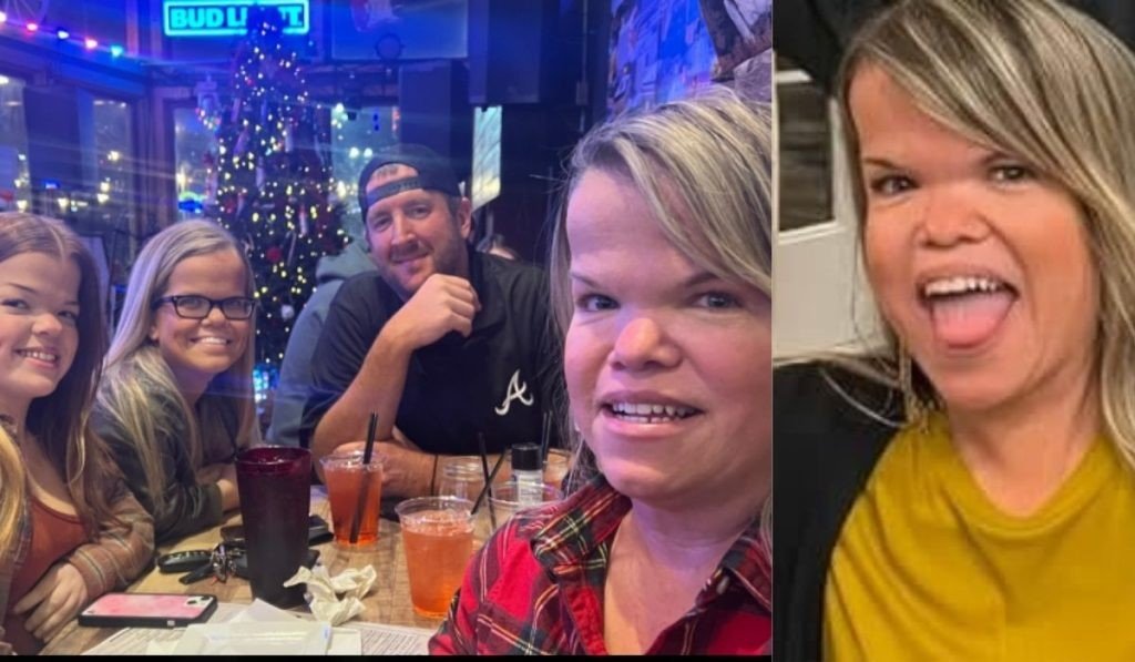 Anna Johnston and Jeffrey Meservey with family at a bar