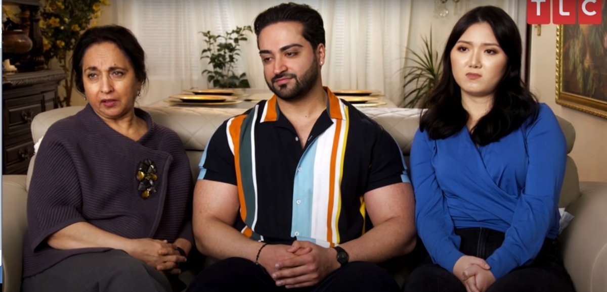 Laila, Shekeb and Emily Chu from I Love a Mama's Boy sitting on a couch