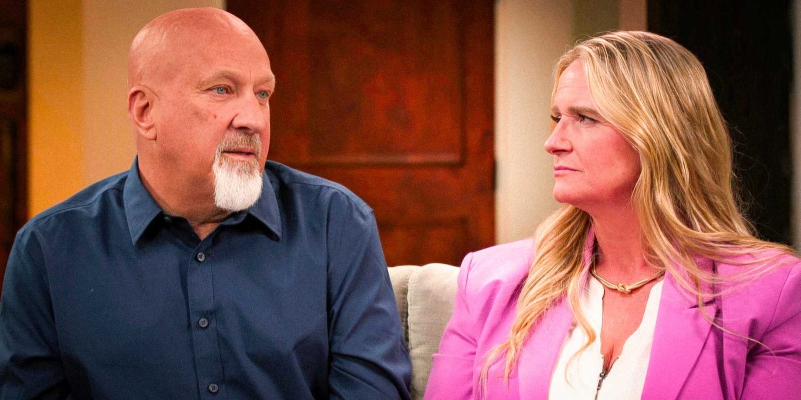 Christine Brown and David Woolley looking serious during an interview