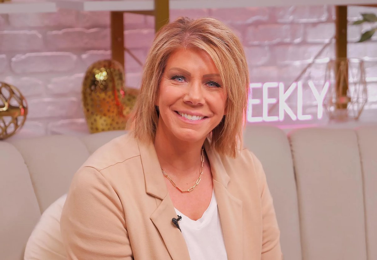 Meri Brown smiling during a studio interview