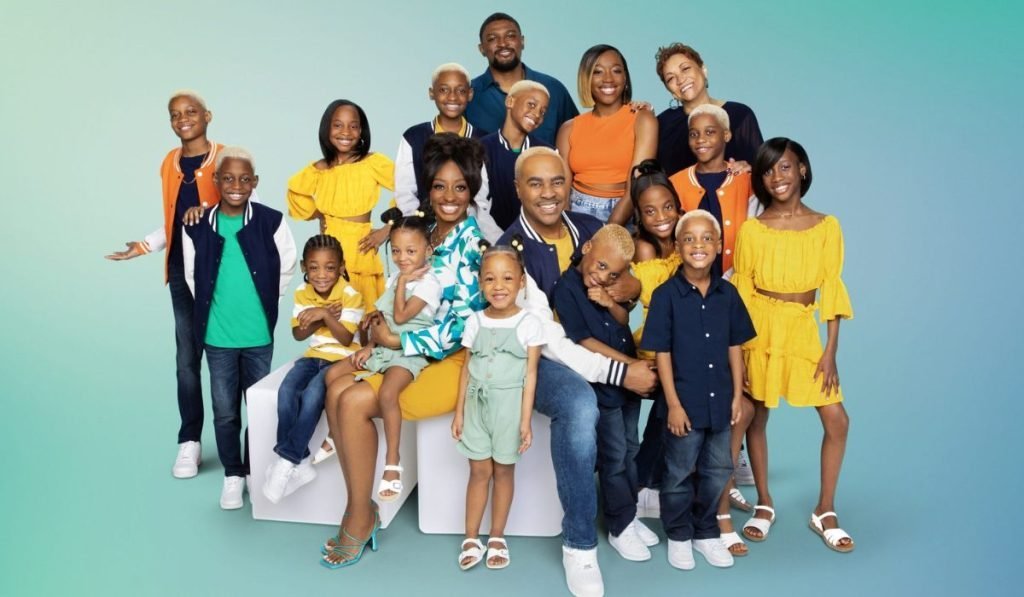 Deon and Karen Derrico posing with their children in a later-season cast photo
