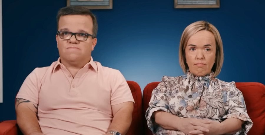 Trent Johnston and Amber Johnston sitting together in a confessional