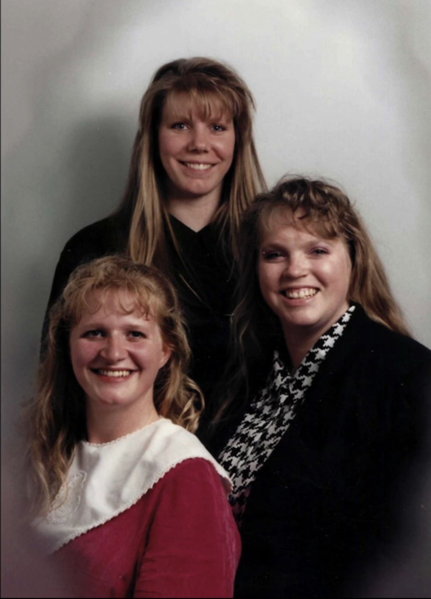 Young Meri, Janelle and Christine Brown posing together in an old photo