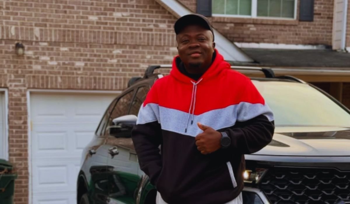 Michael Ilesanmi smiling outdoors