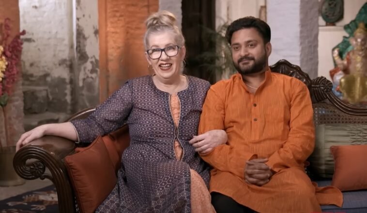 Jenny Slatten and Sumit Singh sitting together