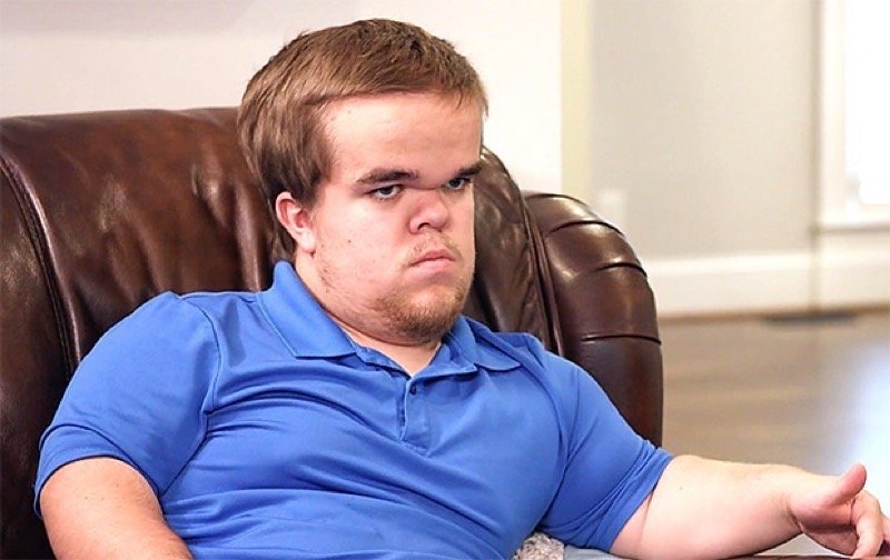 Jonah Johnston sitting in an armchair