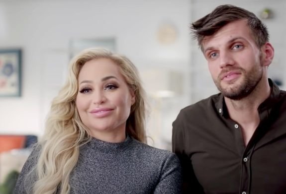 Stacey Silva and Florian Sukaj sitting together in a confessional interview