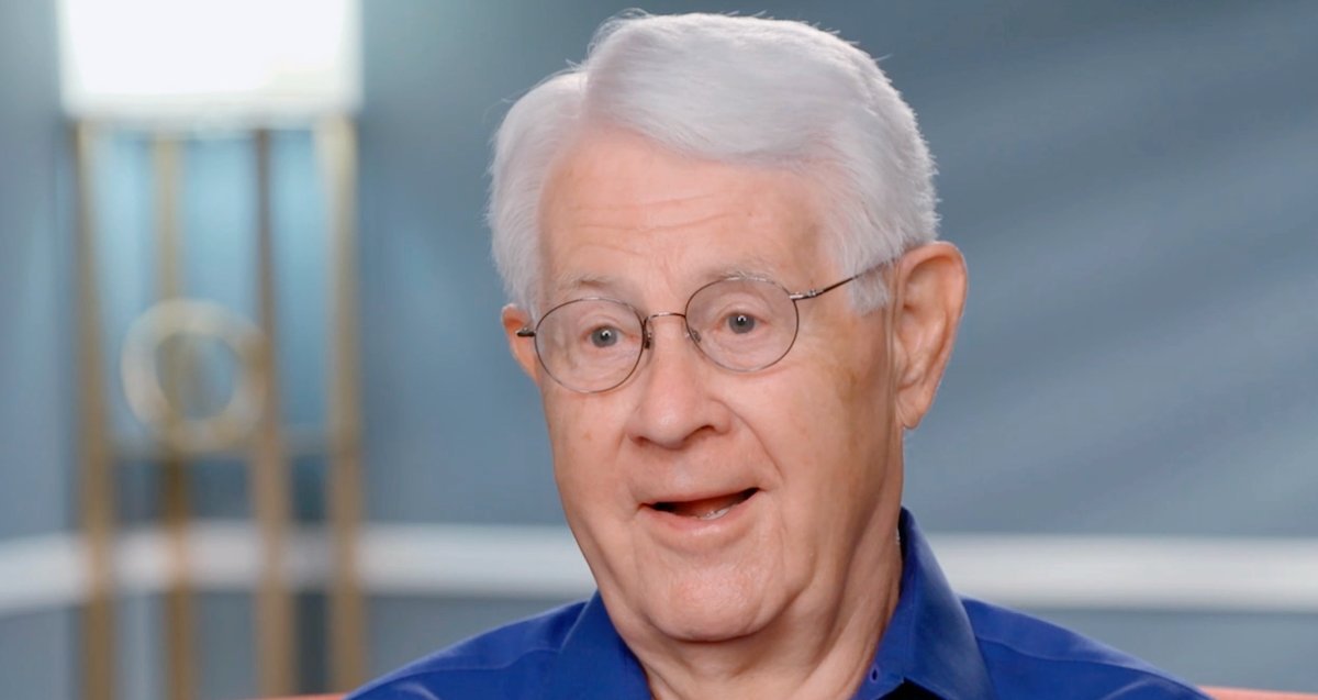Glenn Thore smiling in a confessional