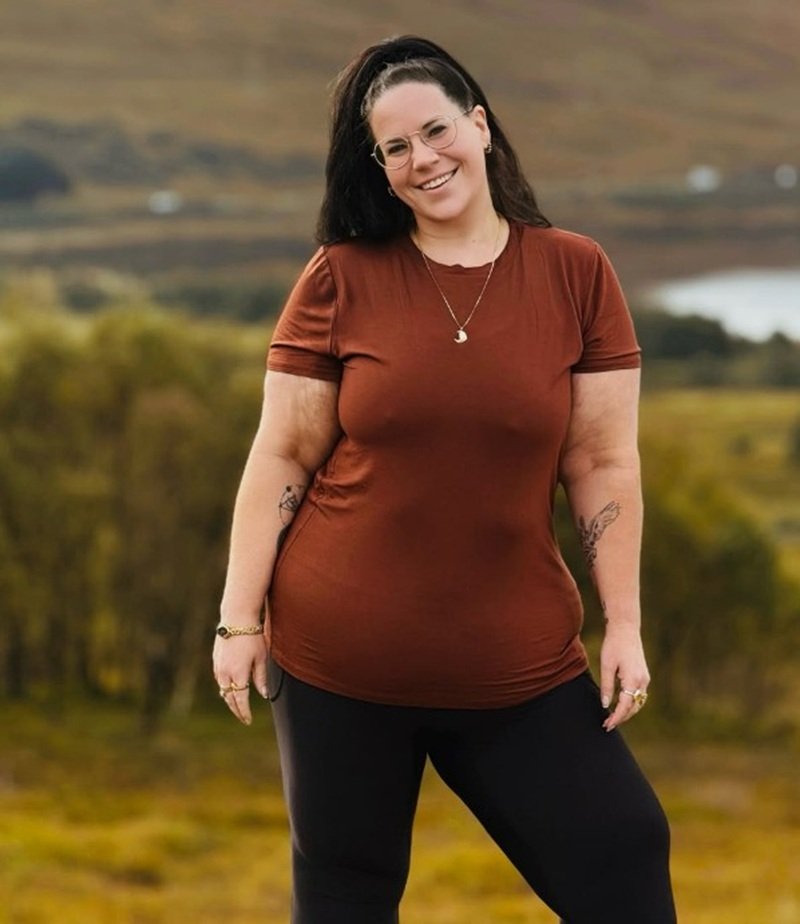Whitney Way Thore smiling outdoors