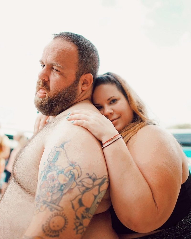 Whitney Thore hugging Buddy Bell outdoors