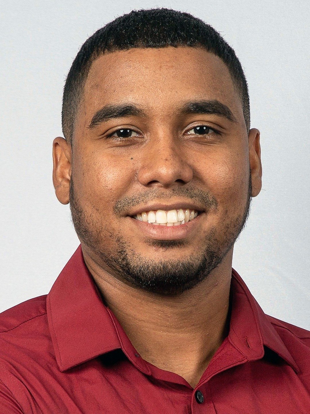 Pedro Jimeno smiling in a portrait