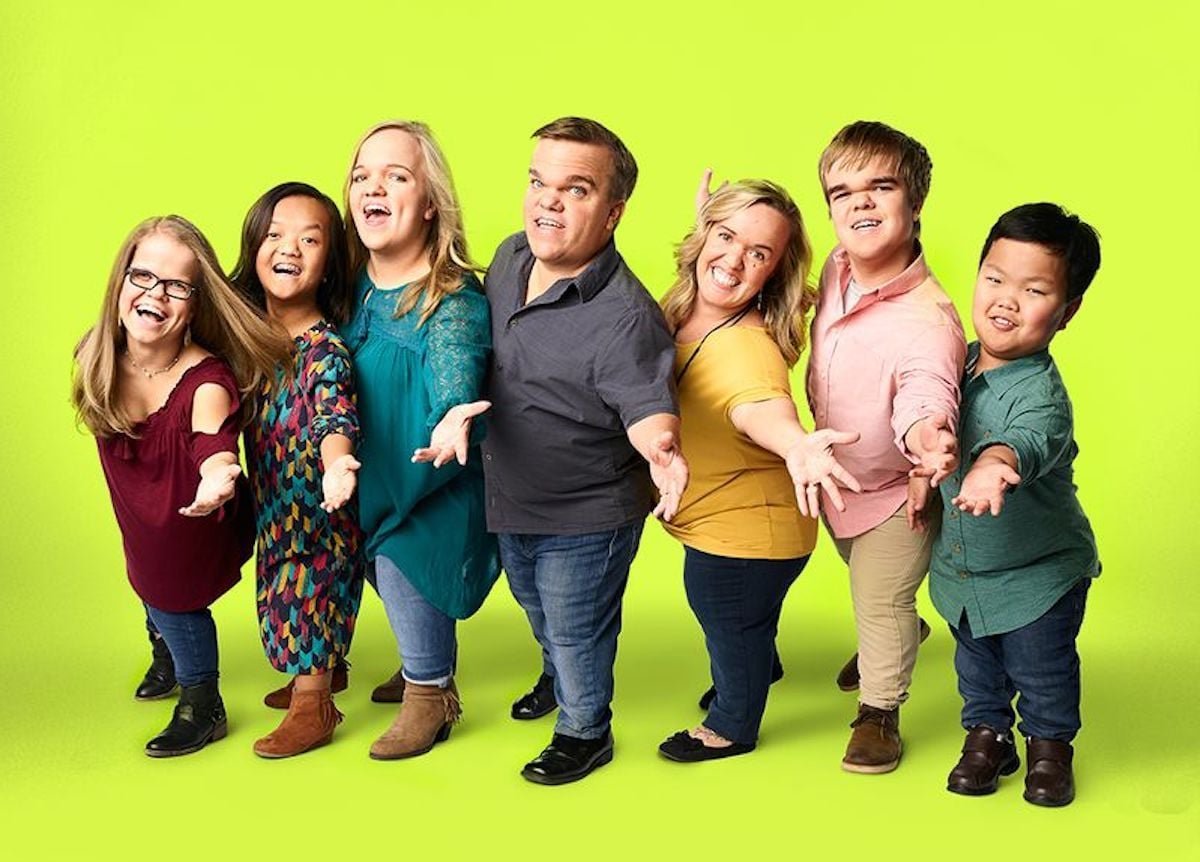 The Johnston family posing together in an earlier cast photo