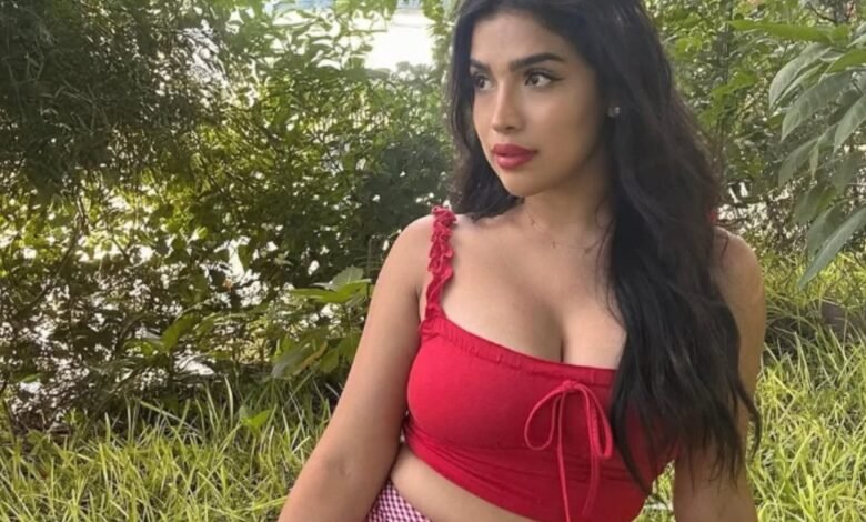 Iris Castillo outdoors in a red top