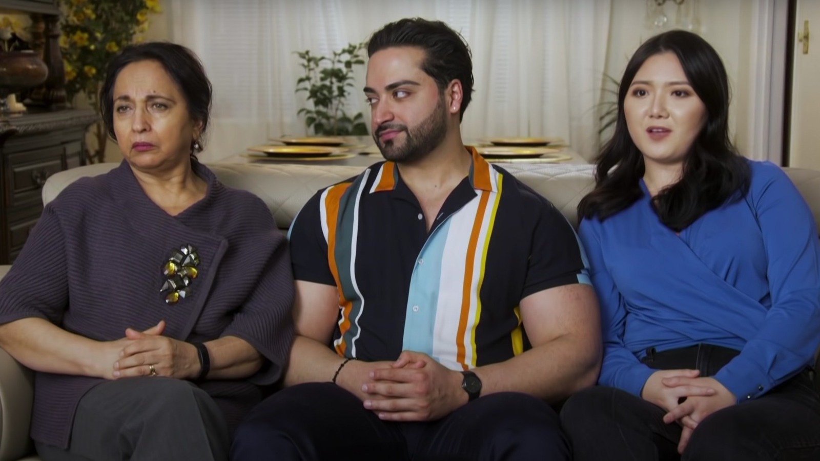Laila, Shekeb and Emily sitting on a sofa on I Love a Mama's Boy
