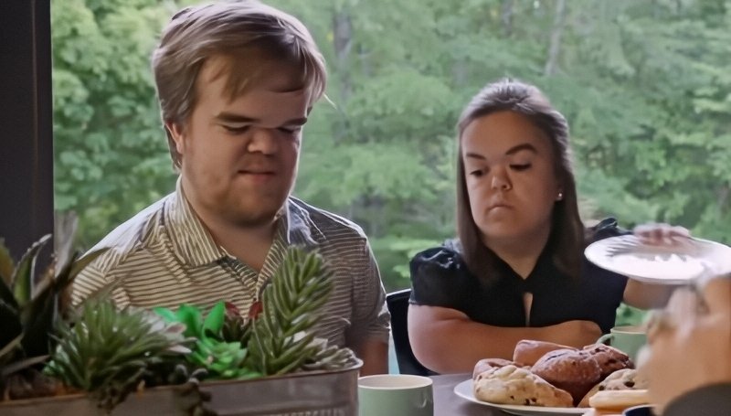Jonah Johnston and Ashley sitting together at a table