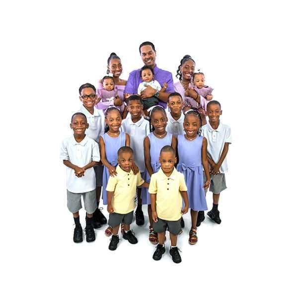 The Derrico family posing together in an early-season portrait
