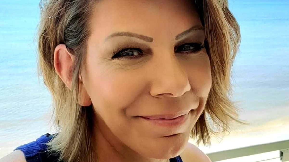 Meri Brown smiling in a selfie outdoors