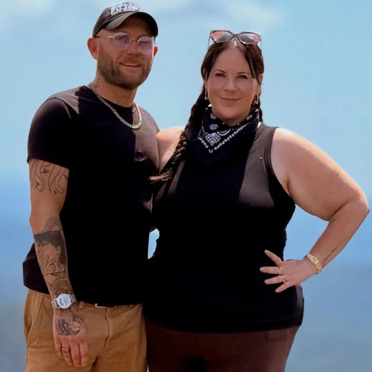 Whitney Thore and Jake Beaudoin smiling together outdoors