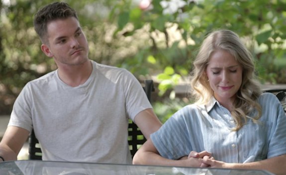 Lydia Plath Wyse and Zac Wyse outdoors, holding hands