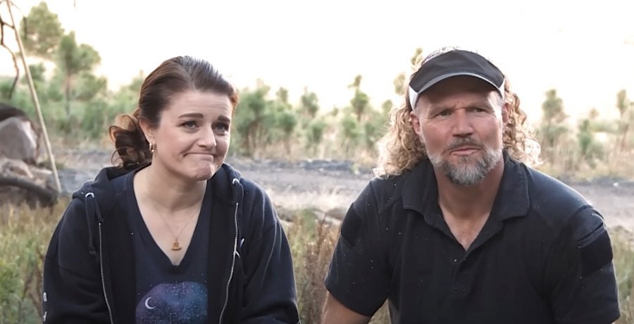 Kody Brown and Robyn Brown sitting outdoors together