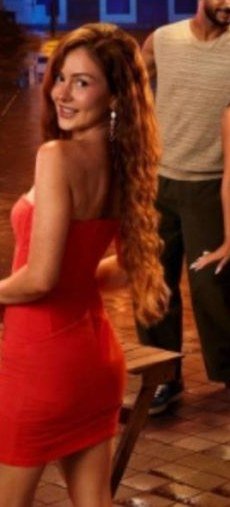 Kara Bass in a red dress in Puerto Rico