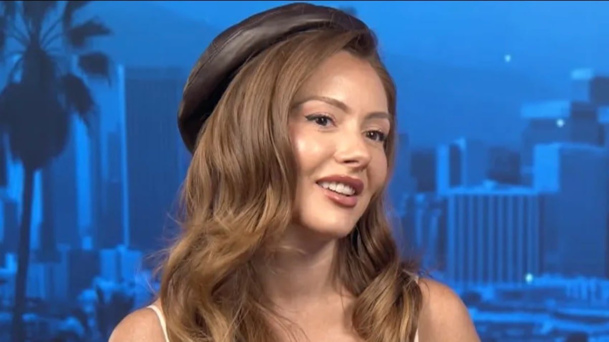 Kara Leona smiling in an Extra TV interview
