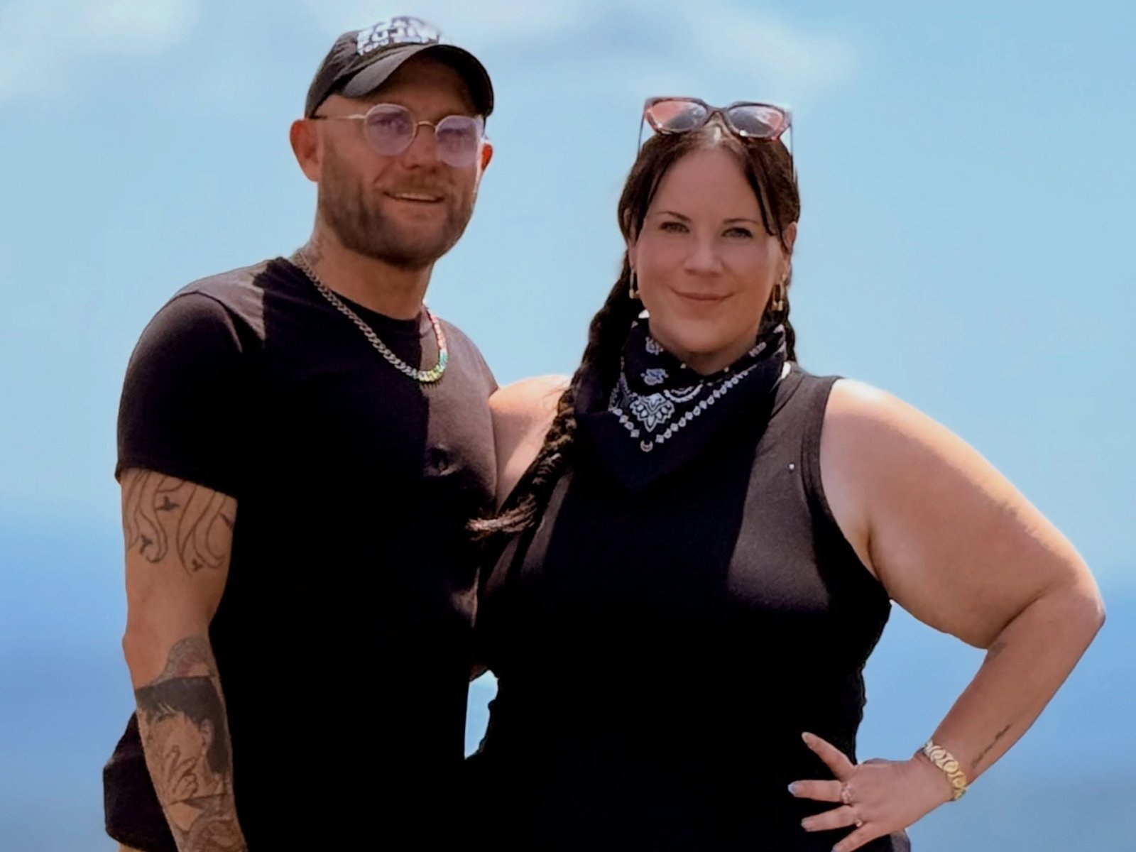 Whitney Thore and Jake Beaudoin smiling together outdoors