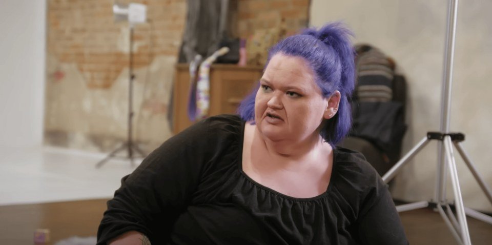 Amy Slaton with purple hair looking expressive in 1000-LB Sisters