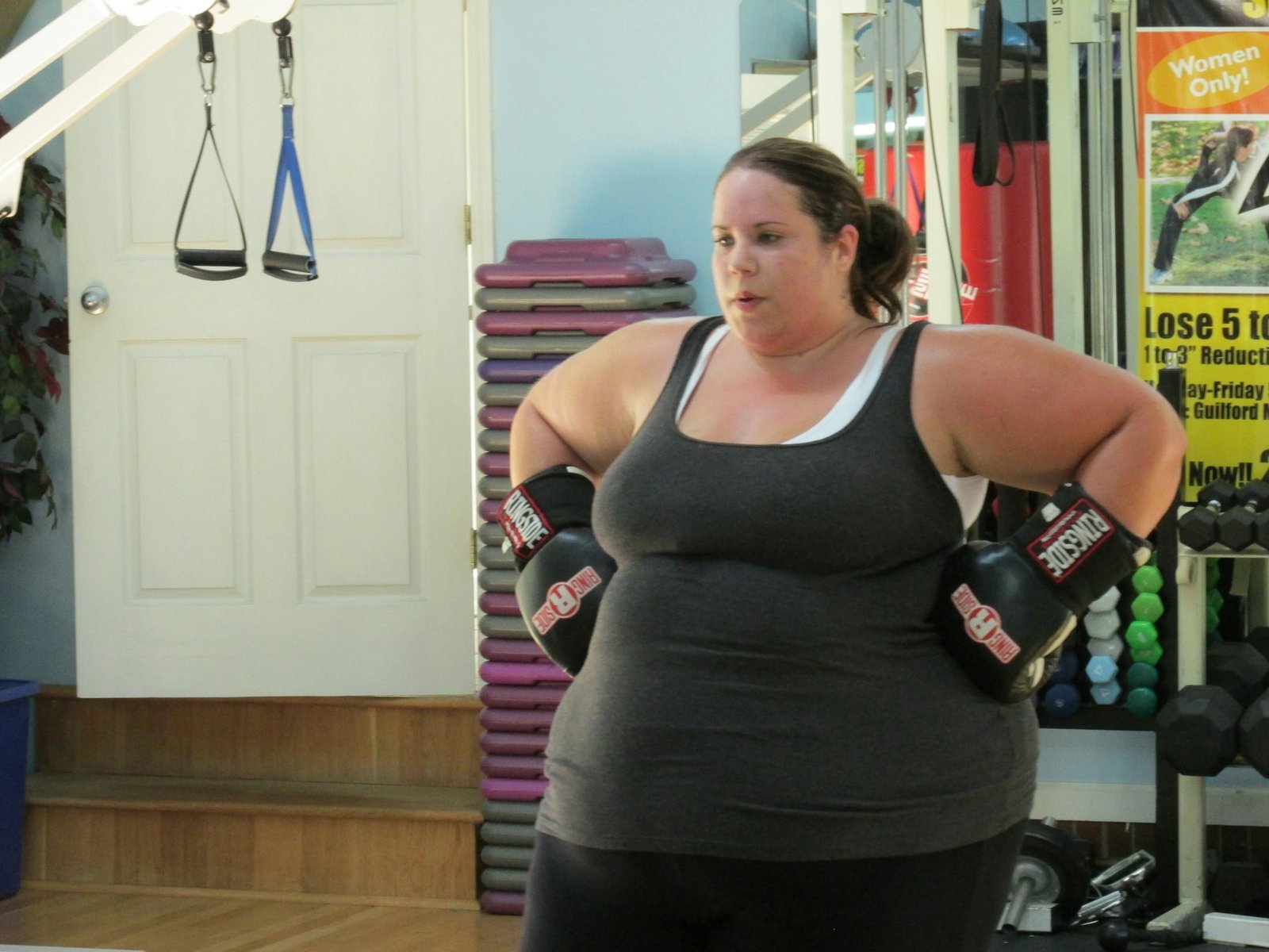 Whitney Thore working out in a gym