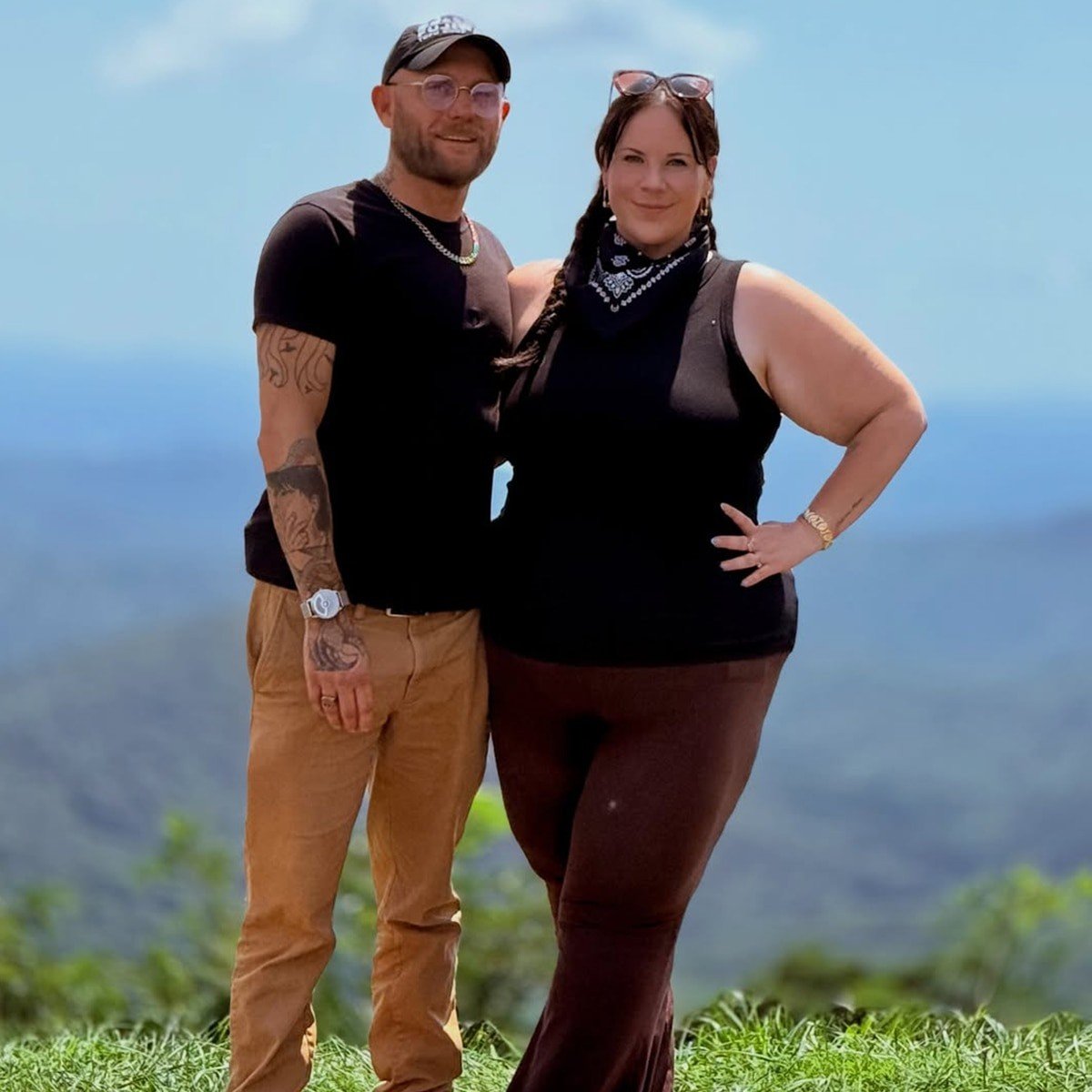 Whitney Thore and Jake Beaudoin smiling together outdoors