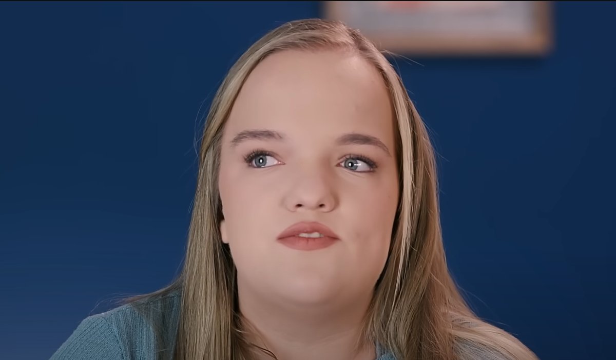 Liz Johnston in a close-up confessional, looking emotional