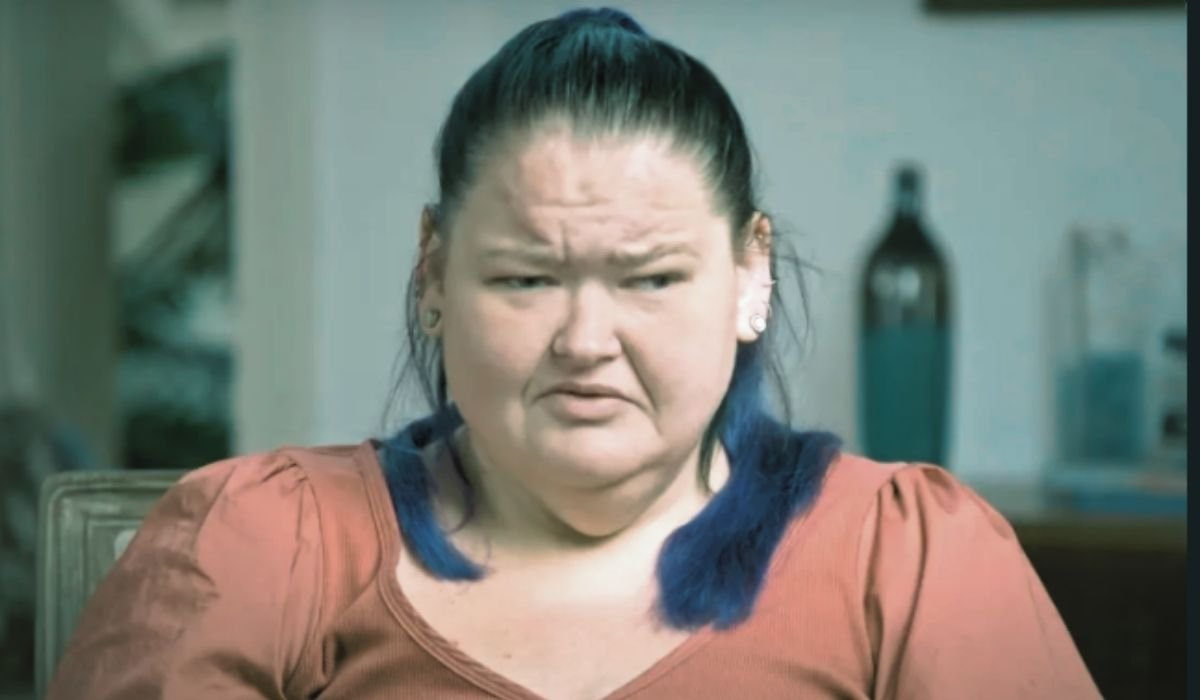 Amy Slaton with a pained, scrunched expression in a close-up still