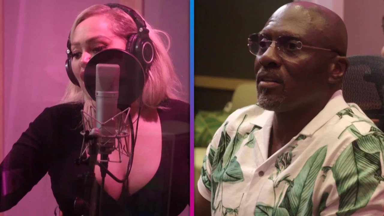 A Silva twin singing into a studio microphone while the producer listens