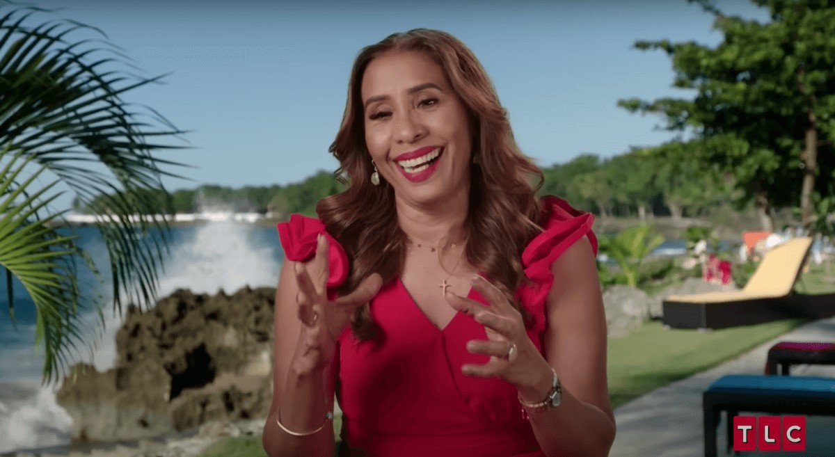 Lidia Jimeno smiling in a red top