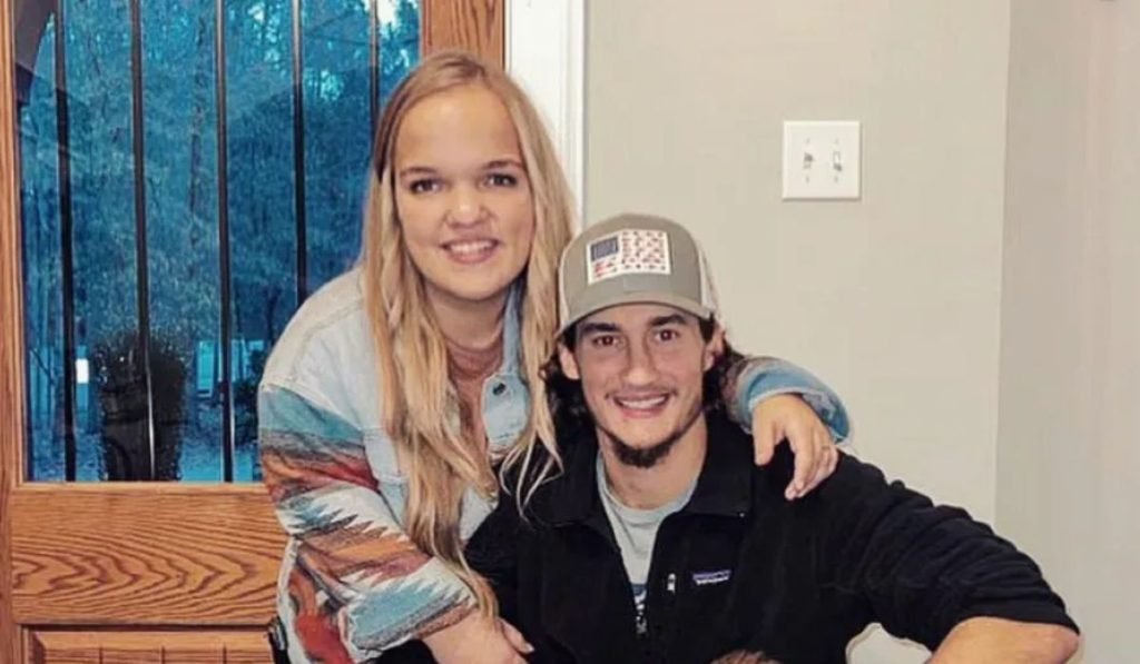 Liz Johnston and Brice Bolden smiling together indoors