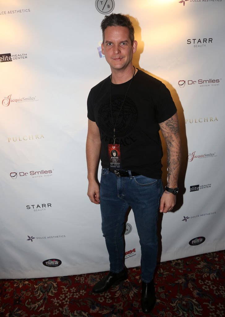 Tom Brooks posing at an event