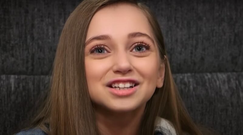 Shauna Rae smiling in a confessional interview